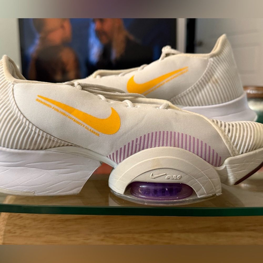Nike Women’s White Low-Profile Sneakers with Purple, Yellow & Teal Accents
